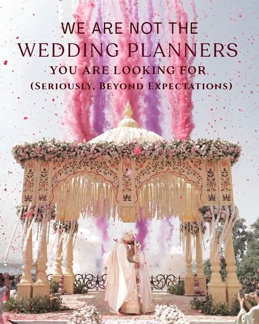 Pastel mandap with pink colour smoke